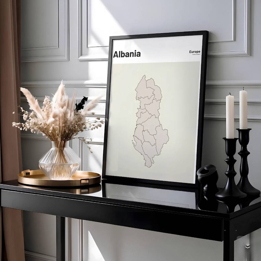 This minimalist line art print showcases Albania with internal regional boundaries and bold header text for an inviting neutral gallery accent. Offered by MapYourDreams, this artwork is available in flexible options including unframed paper, custom wooden frames, and gallery canvas wraps.
