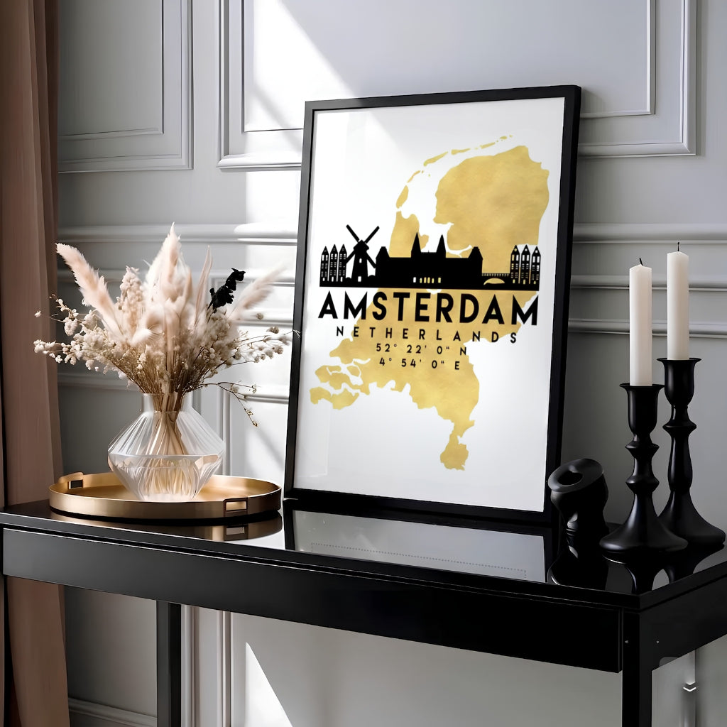 Metallic gold and black Netherlands map wall art featuring Amsterdam coordinates and iconic Dutch architecture, available at MapYourDreams as a high-quality unframed paper print, a durable gallery wrapped canvas, or a sleek custom framed art piece designed to elevate executive office spaces.