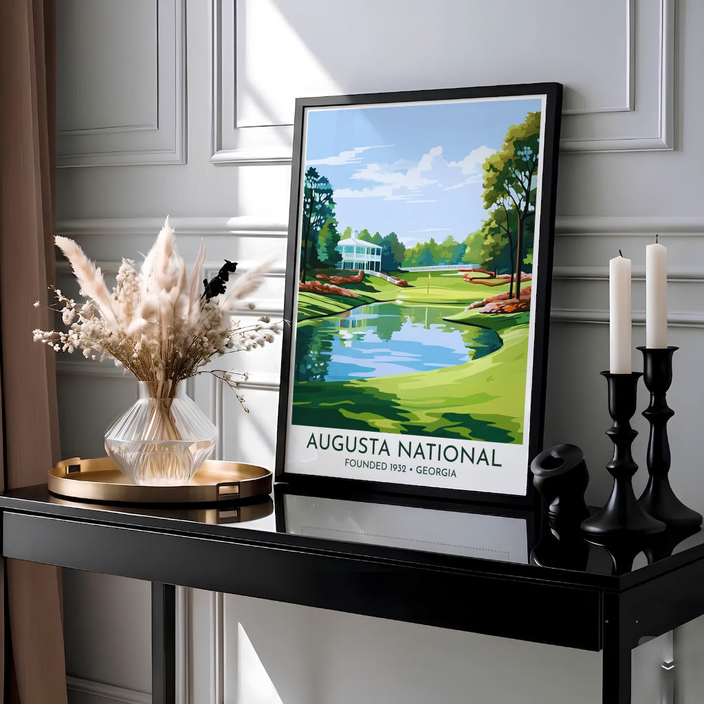 Augusta National 18th hole golf wall art showcasing the historic white clubhouse architecture, vibrant green fairways, and bold typography reading AUGUSTA NATIONAL FOUNDED 1932 GEORGIA. Offered by MapYourDreams, this artwork is available in flexible options including unframed paper, custom wooden frames, and gallery canvas wraps.