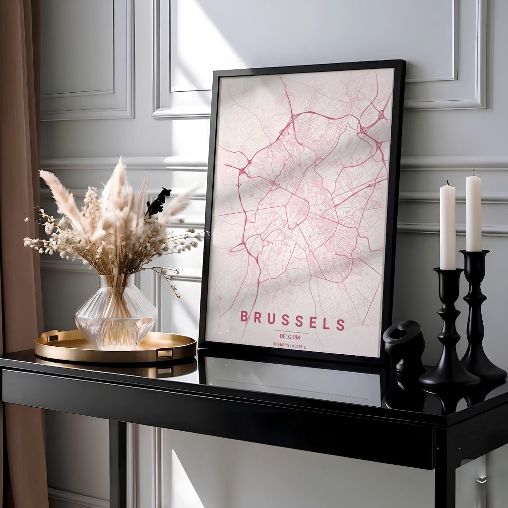 Minimalist city map decor presenting the sprawling roadways and avenues of Brussels, Belgium, against a light blush pink background. MapYourDreams provides this piece across multiple versatile formats including archival paper prints, custom framed styles, and stretched gallery canvas.