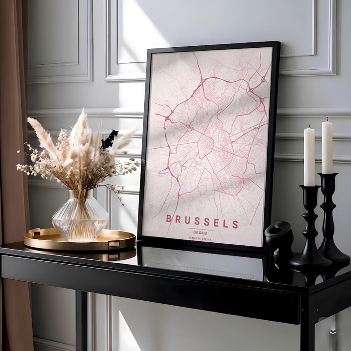 Minimalist city map decor presenting the sprawling roadways and avenues of Brussels, Belgium, against a light blush pink background. MapYourDreams provides this piece across multiple versatile formats including archival paper prints, custom framed styles, and stretched gallery canvas.