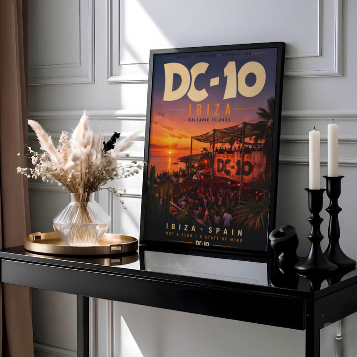 Vintage style electronic music poster showing partygoers at DC-10 terrace overlooking the Mediterranean ocean in Ibiza, Spain, presented by MapYourDreams as an unframed poster print, stretched canvas art, or custom framed decor for entertainment basements.