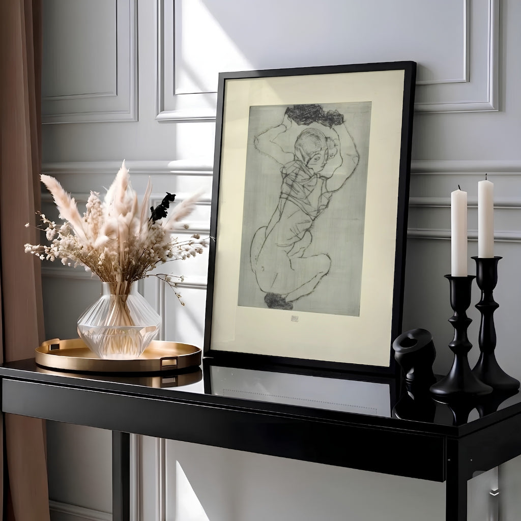 Masterful drypoint nude print of Egon Schiele Crouching Female Nude 1914 housed in Leopold Museum Vienna showcasing intense contour line work. MapYourDreams offers framed prints, unframed paper posters, and stretched canvas art prints for minimalist home libraries, reading nooks, and studio work spaces.