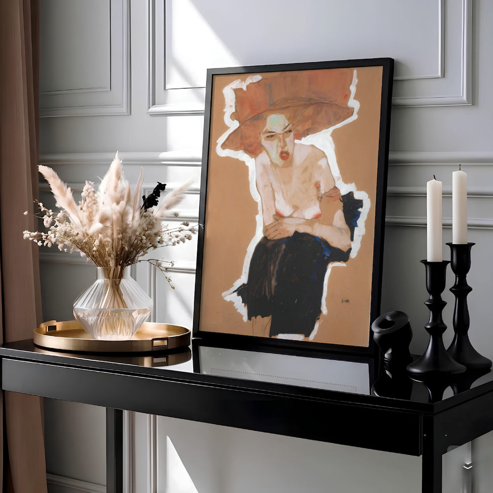 Viennese Expressionist figure poster of Egon Schiele Seated Woman With Hat 1910 from Vienna Austria with a bold terracotta red hat. Choose an unframed paper poster, a gallery stretched canvas print, or custom framed wall art directly from MapYourDreams for an artistic home decor accent.