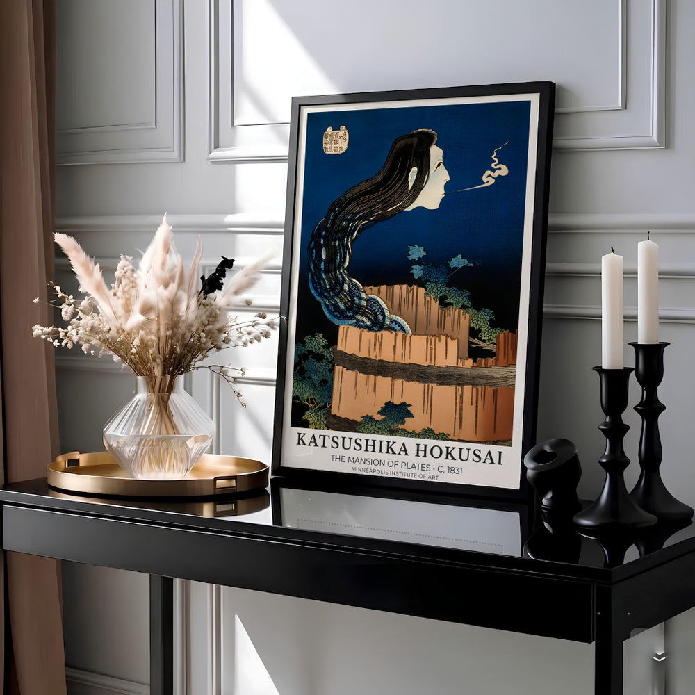 Vintage Edo period ghost woodblock poster of The Mansion of Plates by artist Katsushika Hokusai showing Okiku rising from a well in Minneapolis. Available as unframed prints, gallery canvas, or framed wall decor at MapYourDreams.