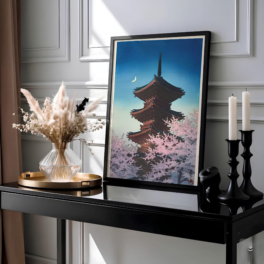 Vintage Japanese travel woodblock poster Spring Evening Ueno by artist Kawase Hasui showing illuminated pagoda tiers and pink sakura at Spring Evening Ueno. Available as unframed prints, gallery canvas, or framed wall decor at MapYourDreams.