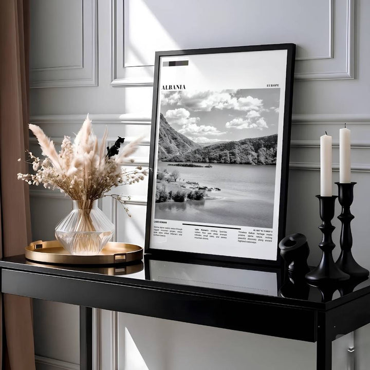 Showcasing the wild beauty of Lake Koman in northern Albania, this editorial travel print brings sophisticated monochrome design into modern living spaces. Available through MapYourDreams with display choices like unframed paper stock, custom frames, and stretched canvas options.