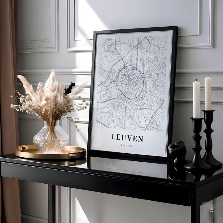 High-contrast black and white street map print of Leuven, Belgium, featuring elegant serif typography. MapYourDreams provides this piece across multiple versatile formats including archival paper prints, custom framed styles, and stretched gallery canvas.