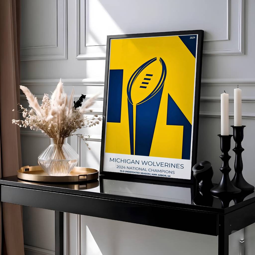 Modern graphic football poster displaying Michigan Wolverines 2024 National Champions typography and trophy silhouette. Presented by MapYourDreams, this artwork is available in flexible options including unframed paper, custom wooden frames, and gallery canvas wraps for living room art.