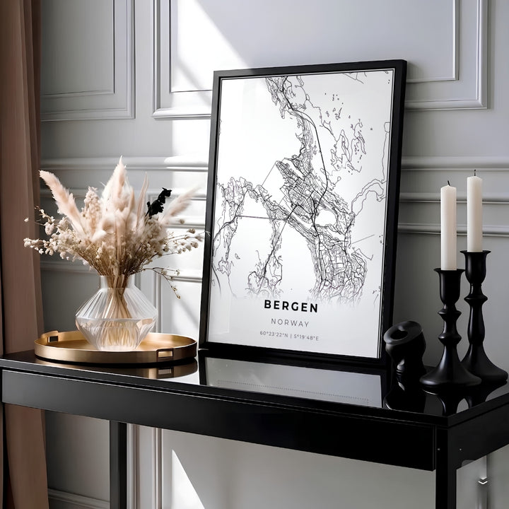 Minimalist road map print of Bergen Norway featuring black street lines on a crisp white background with modern sans-serif typography. Designed for sleek home interiors, this artwork comes as a ready-to-hang framed poster, stretched canvas wrap, or classic unframed paper print.