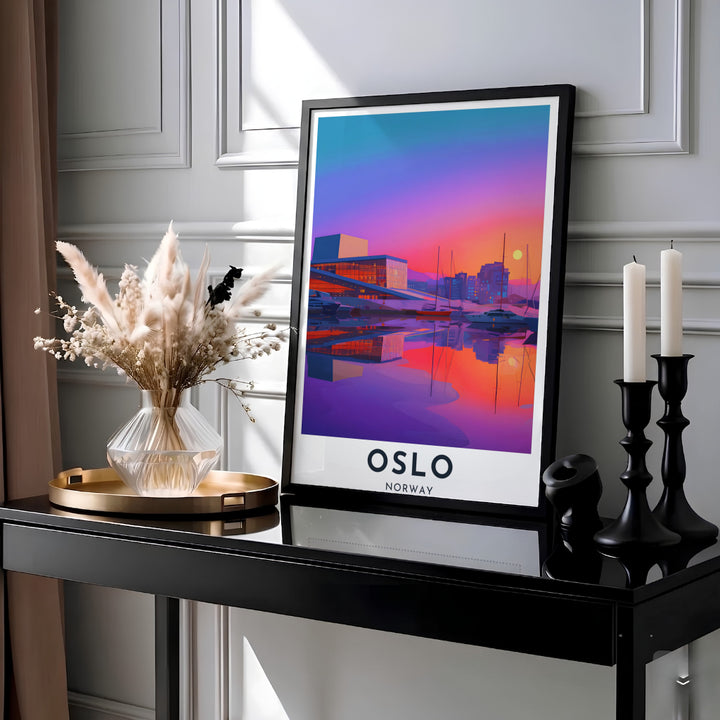 Dramatic dusk landscape print featuring the Oslo Opera House illuminated against an orange and purple sunset sky with still harbor water reflections in Norway. Ideal for modern interior styling, choose between simple unframed poster paper, protective framed designs, or gallery wrap canvas options for your wall arrangement.