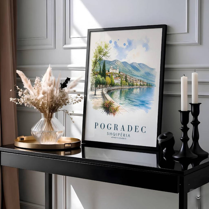 Showcasing the historic resort promenade of Pogradec Albania with geographic coordinates 40.9025° N, 20.6556° E, this travel print brings Balkan peace home. Available through MapYourDreams with display choices like unframed paper stock, custom frames, and stretched canvas options.