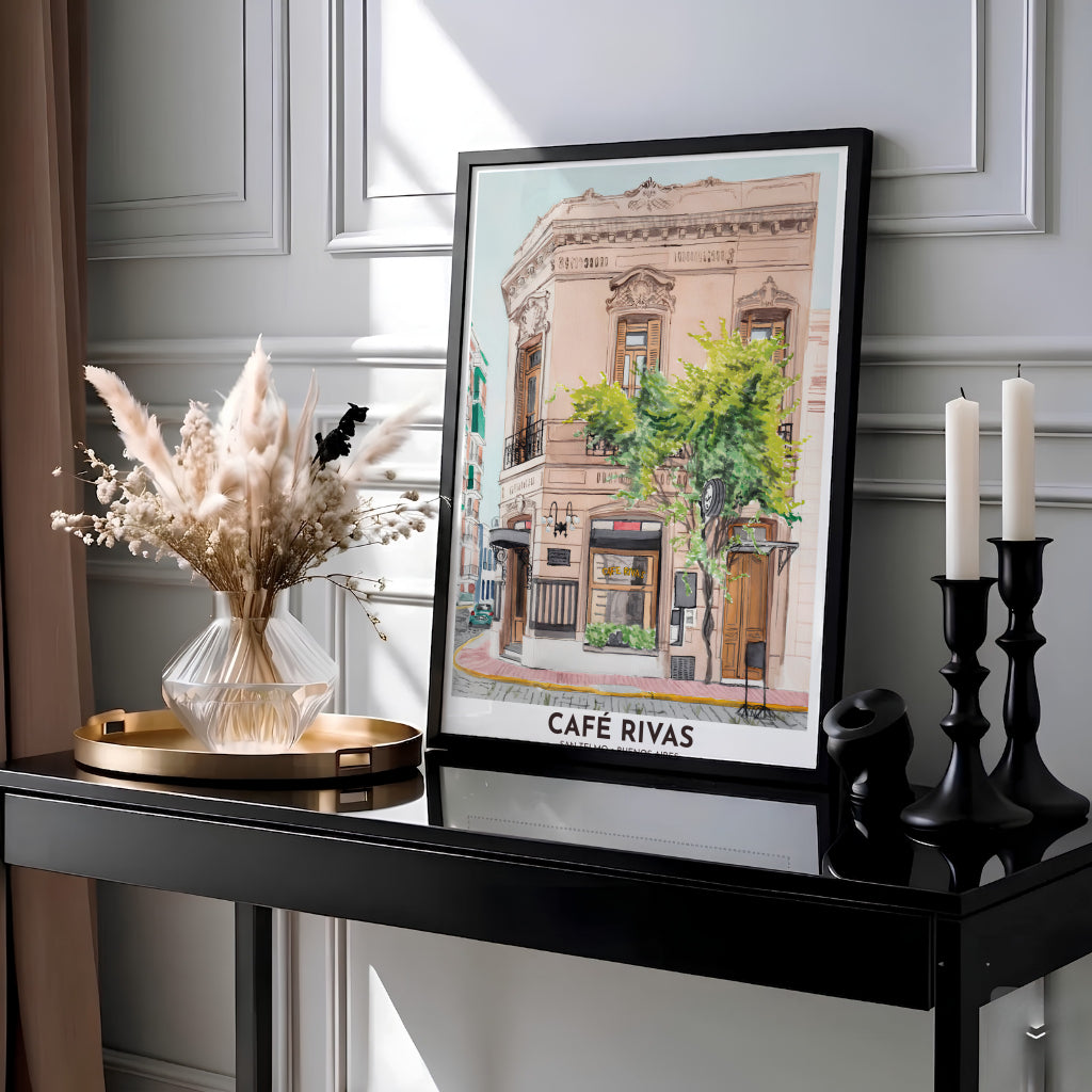 Showcasing the historic cafe culture of central Buenos Aires, this San Telmo Cafe Rivas wall art features a delicate watercolor streetscape with tall shuttered windows, designed by MapYourDreams across versatile formats including unframed paper, custom frames, and canvas wraps.