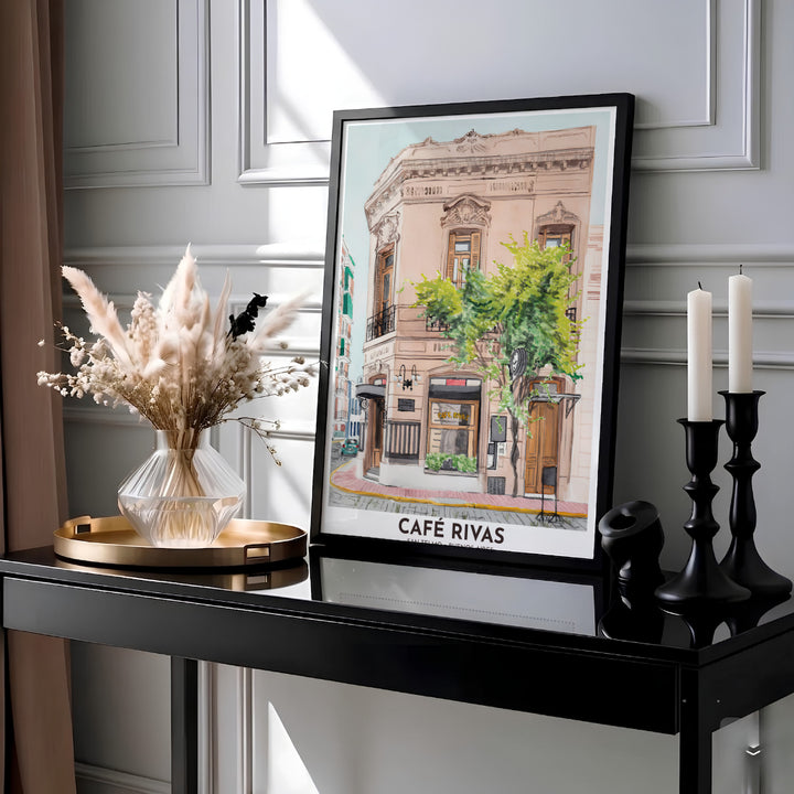Showcasing the historic cafe culture of central Buenos Aires, this San Telmo Cafe Rivas wall art features a delicate watercolor streetscape with tall shuttered windows, designed by MapYourDreams across versatile formats including unframed paper, custom frames, and canvas wraps.