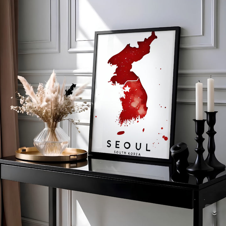 Expressive red and white painterly map wall art highlighting Seoul and the Korean peninsula, supplied by MapYourDreams in adaptable styles including unframed paper, custom black frames, and fine gallery canvas prints ideal for modern and minimalist aesthetic setups.