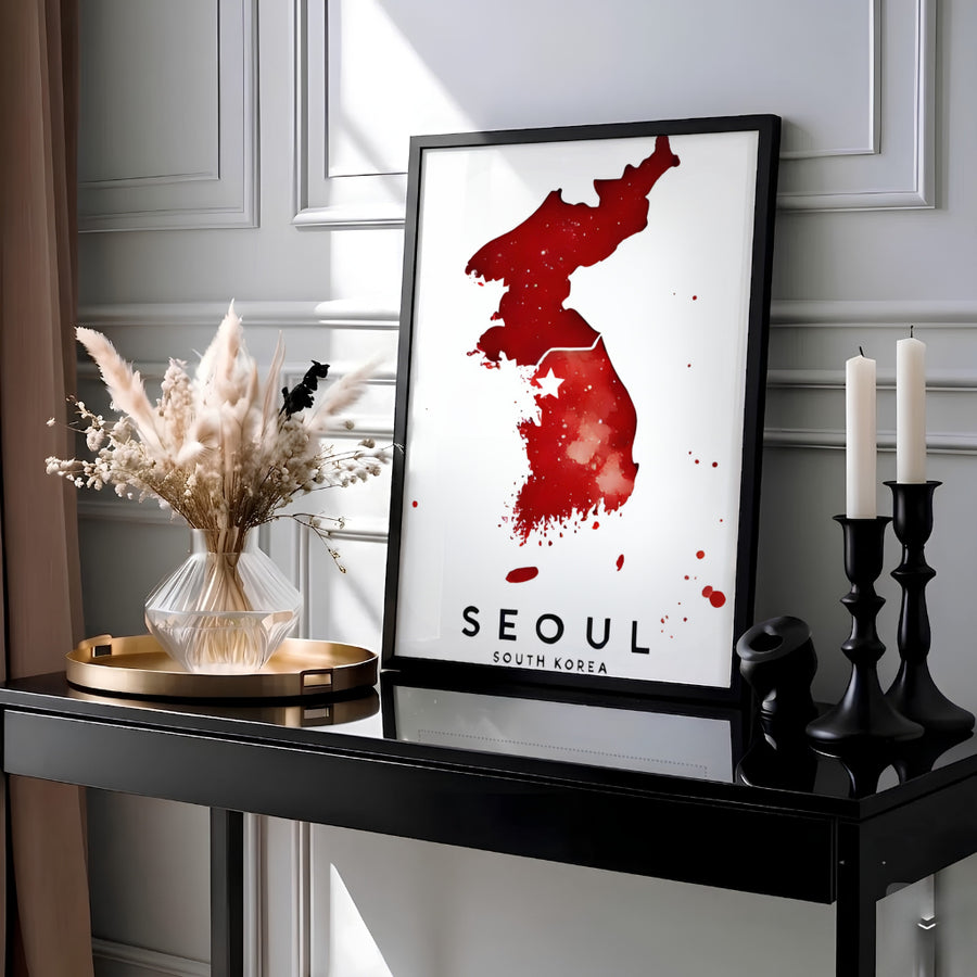 Expressive red and white painterly map wall art highlighting Seoul and the Korean peninsula, supplied by MapYourDreams in adaptable styles including unframed paper, custom black frames, and fine gallery canvas prints ideal for modern and minimalist aesthetic setups.