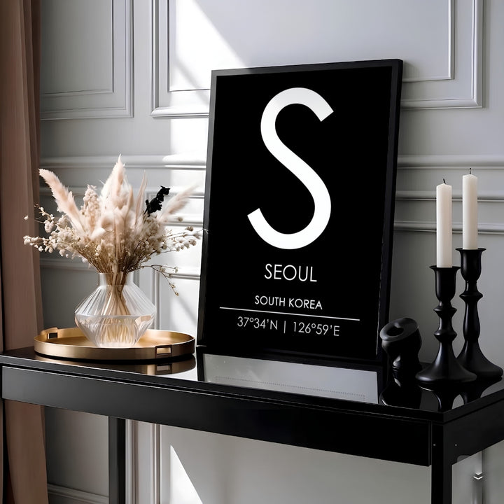 Clean architectural seoul south korea monogram letter S print with bottom typography and coordinates, created by MapYourDreams across options like unframed paper, custom black frames, and fine gallery canvas prints ideal for Scandinavian and minimalist home aesthetic setups.