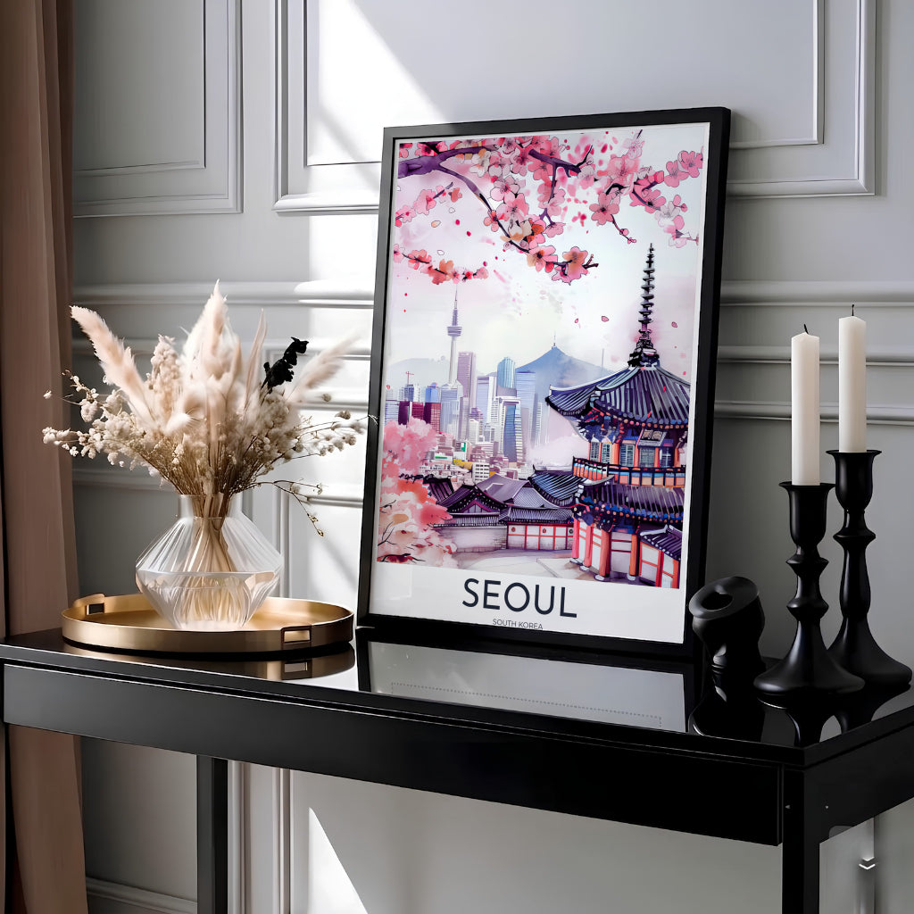 Soft pink spring travel poster featuring floral cherry blossom branches, historic temple architecture, and skyscrapers in Seoul South Korea, presented by MapYourDreams with versatile choices such as unframed archival paper, sleek picture frames, and stretched canvas options designed to complement modern interiors.