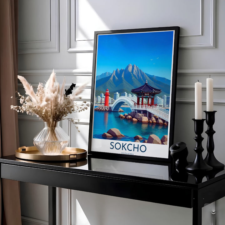 Korean coastal pavilion poster capturing the turquoise ocean, red lighthouse, and granite peaks of Sokcho South Korea, supplied by MapYourDreams in adaptable styles including unframed paper, custom black frames, and fine gallery canvas prints ideal for sunroom wall art setups.