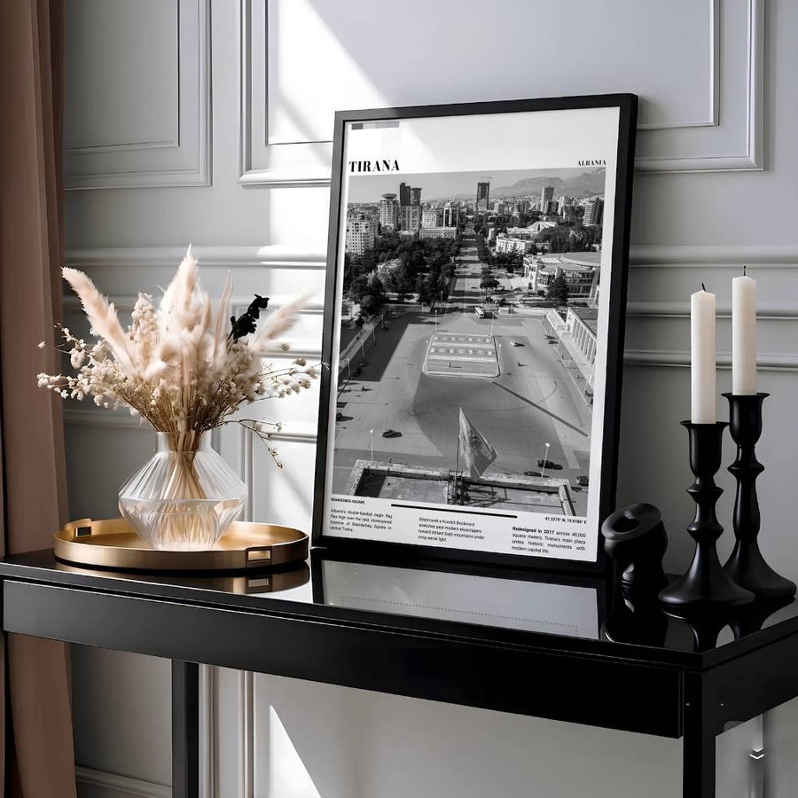 Showcasing the historic Skanderbeg Square of Tirana Albania through dramatic Black &amp; White photography with geographic coordinates 41.3275° N, 19.8186° E, this travel photo print brings civic heritage home. Available through MapYourDreams with display choices like unframed paper stock, custom frames, and stretched canvas options.