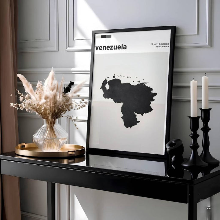 Swiss graphic style cartography poster of Venezuela showcasing a solid black country shape, lowercase text, and color swatch bar. Presented by MapYourDreams, this piece comes in flexible choices such as unframed paper stock, custom frames, and gallery canvas wraps.