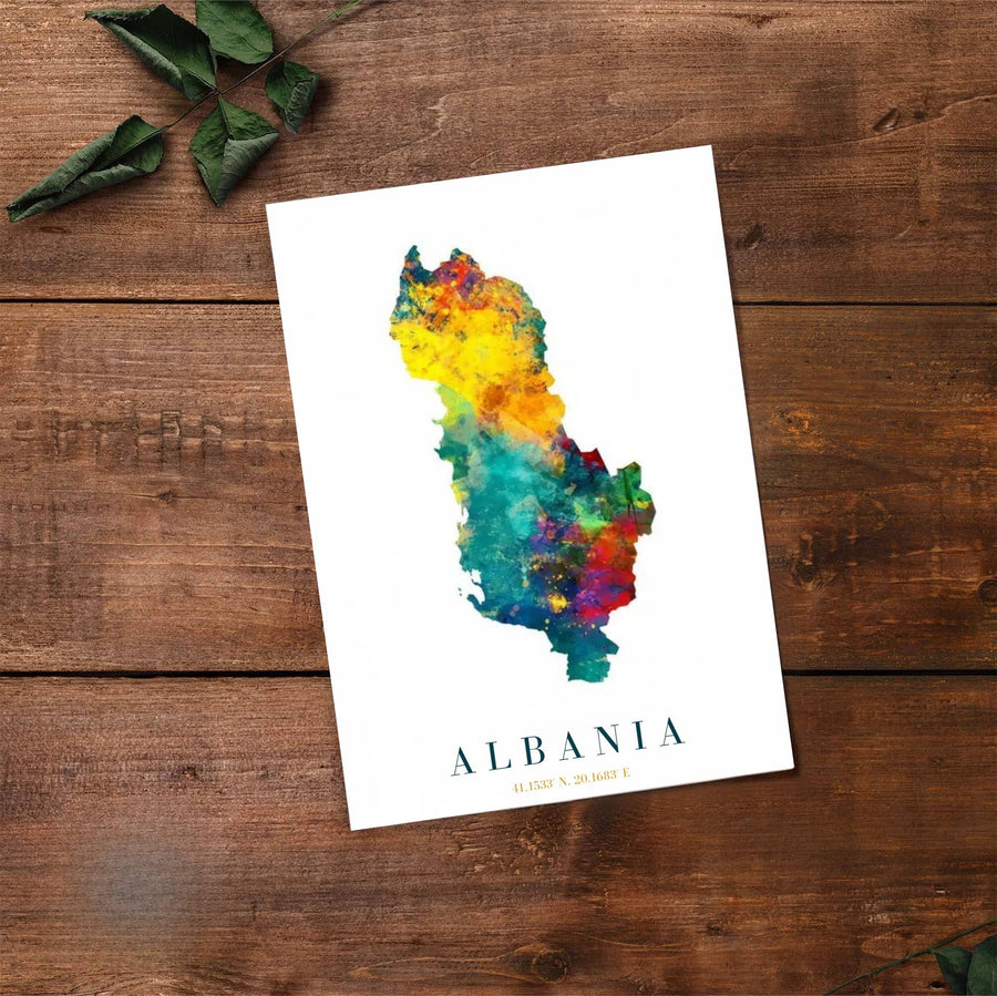 Fine art travel poster displaying the silhouette of Albania in fluid rainbow watercolor with exact coordinates 41.1533° N, 20.1683° E printed underneath. Offered by MapYourDreams, this artwork is available in flexible options including unframed paper, custom wooden frames, and gallery canvas wraps.