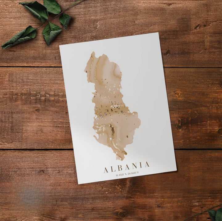 Fine art travel poster displaying the silhouette of Albania in fluid cream and gold marble with exact coordinates 41.1533° N, 20.1683° E below. Offered by MapYourDreams, this artwork is available in flexible options including unframed paper, custom wooden frames, and gallery canvas wraps.
