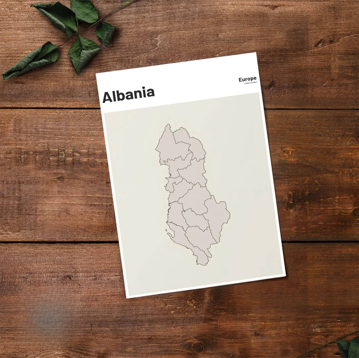 Fine art travel poster displaying the silhouette of Albania in vector line art with exact geographical coordinates 41.1533° N, 20.1683° E printed above. Offered by MapYourDreams, this artwork is available in flexible options including unframed paper, custom wooden frames, and gallery canvas wraps.
