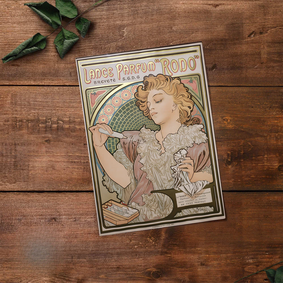 Historic French travel print Lance Parfum Rodo by artist Alphonse Mucha with authentic signature details reflecting Art Nouveau heritage in Paris France. Select premium framed, unframed, and canvas wall decor options at MapYourDreams.