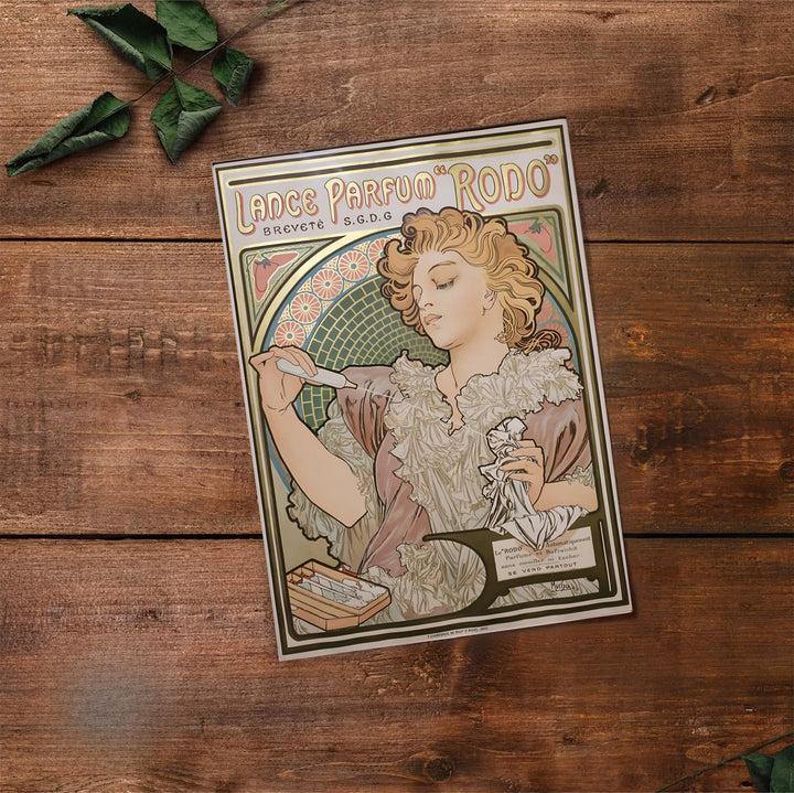 Historic French travel print Lance Parfum Rodo by artist Alphonse Mucha with authentic signature details reflecting Art Nouveau heritage in Paris France. Select premium framed, unframed, and canvas wall decor options at MapYourDreams.