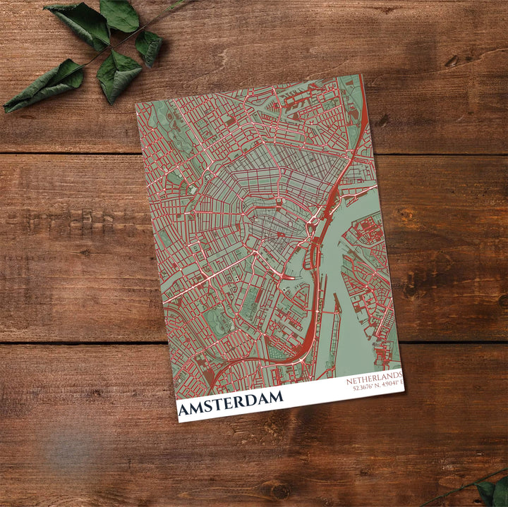 Architectural cartography print of historic and modern Amsterdam street grids in sage green, teal, and terracotta red, available from MapYourDreams where you can select between premium unframed paper, gallery canvas, or custom framed wall art options for living room or bedroom decoration.