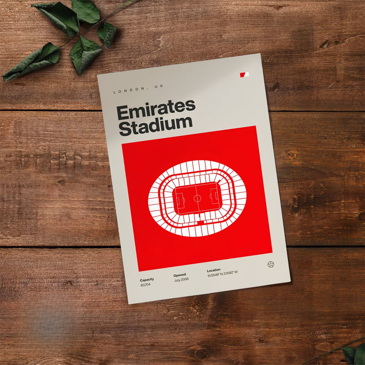 Dynamic vector art illustration of Emirates Stadium featuring its top-down structural geometry, red color accent, and modern typography. Created by MapYourDreams, choose from options like unframed paper prints, custom wood framed setups, or gallery wrapped canvas displays.