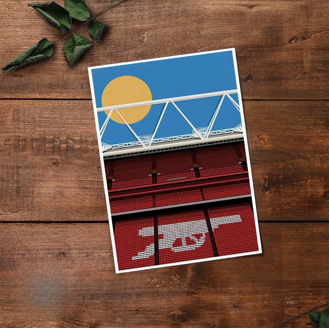 Detailed vector graphic artwork of Emirates Stadium featuring its red seating bowl, white cannon icon, and bright sunny sky atmosphere. Created by MapYourDreams, choose from options like unframed paper prints, custom wood framed setups, or gallery wrapped canvas displays.