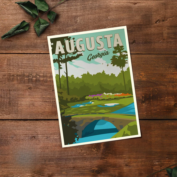 Augusta National Golf Course travel poster depicting serene green turf, pristine white sand bunkers, and the stone Hogan Bridge. Offered by MapYourDreams, this artwork is available in flexible options including unframed paper, custom wooden frames, and gallery canvas wraps for tailored home wall decor setups.