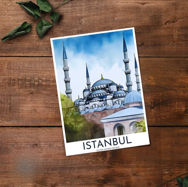 Travel poster of Istanbul Turkey featuring Sultan Ahmed Mosque under a bright sky with vibrant blue watercolor washes. Prepared by MapYourDreams, this artwork is available in flexible options including unframed paper, custom wooden frames, and gallery canvas wraps for chic home decor.