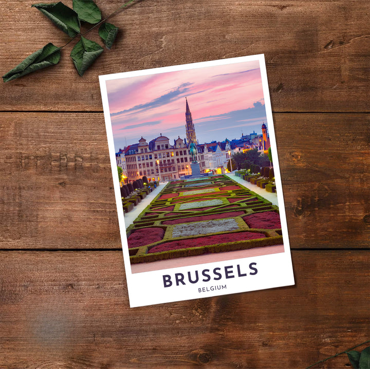 Fine art travel decor depicting the manicured parterres and historic skyline of Mont des Arts in Brussels, Belgium, under a vibrant sunset. Offered by MapYourDreams, this artwork is available in flexible options including unframed paper, custom wooden frames, and gallery canvas wraps.