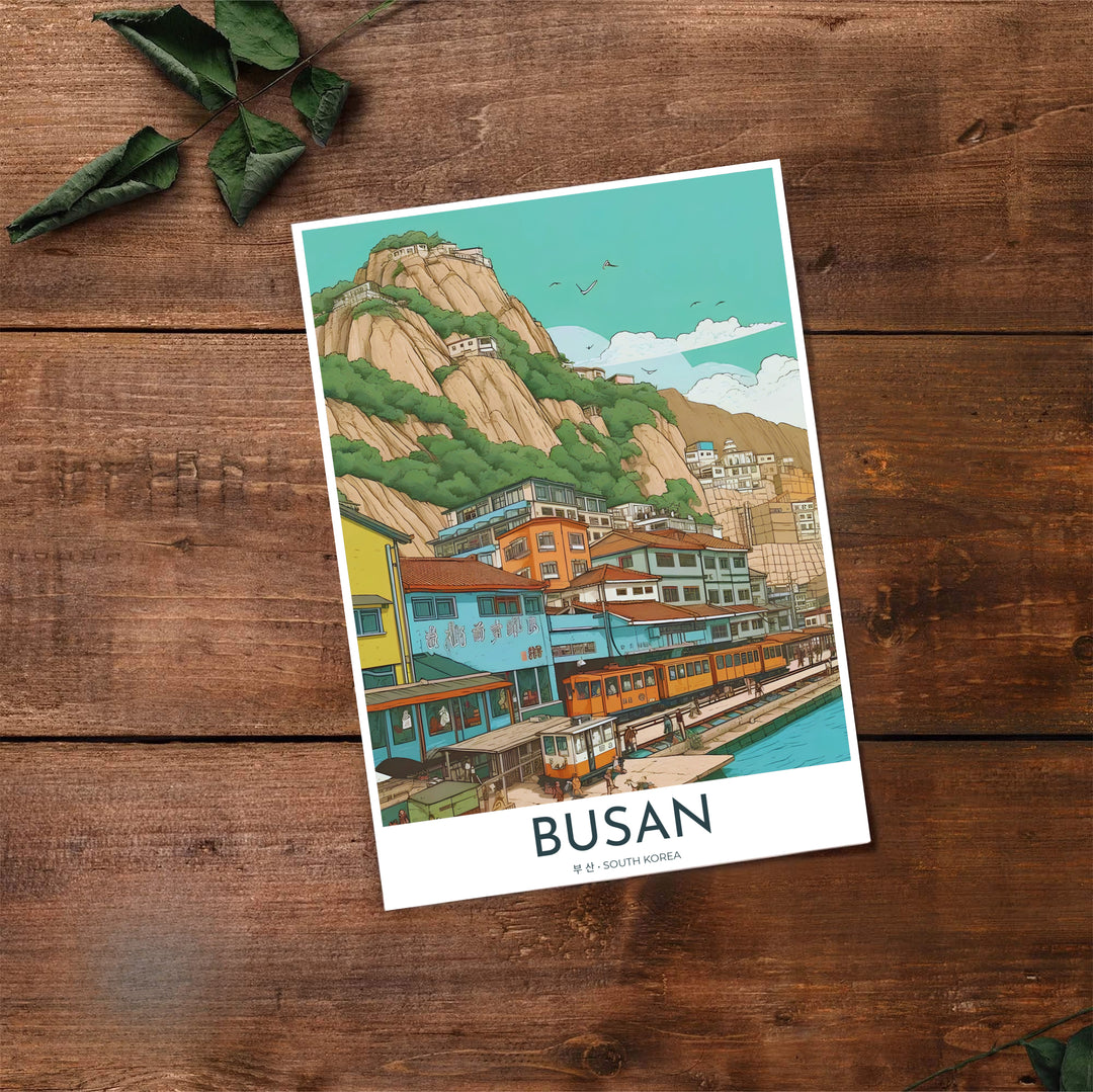 High-contrast line art travel print of Busan, South Korea, featuring bright yellow train cars, turquoise ocean harbor views, and towering mountain cliffs. Offered by MapYourDreams, this artwork is available in flexible options including unframed paper, custom wooden frames, and gallery canvas wraps.