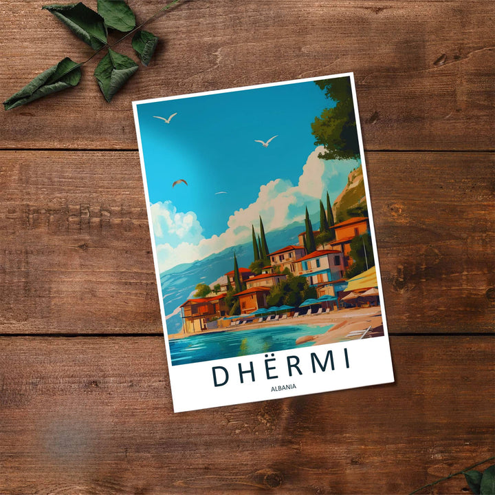 Fine art travel poster showing Dhërmi Beach with sun loungers, blue waters, and hillside stone houses illuminated by bright sunlight. Offered by MapYourDreams, this artwork is available in flexible options including unframed paper, custom wooden frames, and gallery canvas wraps.