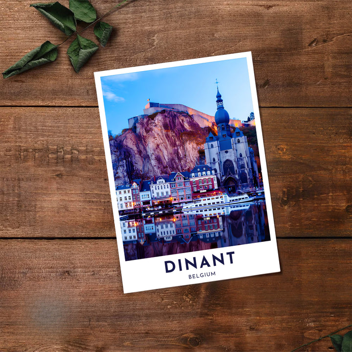 European travel photograph presenting a rich cobalt sky and warm streetlights over Dinant, Belgium. Offered by MapYourDreams, this artwork is available in flexible options including unframed paper, custom wooden frames, and gallery canvas wraps.