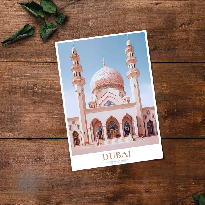 High detail vector print depicting Dubai Jumeirah Mosque facade, lattice dome, and pointed arch portico in pastel pink. Brought by MapYourDreams, this artwork is available in flexible options including unframed paper, custom wooden frames, and gallery canvas wraps for study room decor.