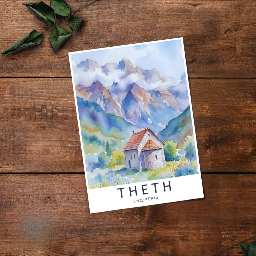 Fine art travel poster showing Kisha e Thethit with misty skies, stone bell tower, and alpine village houses nestled in the valley background. Choose from flexible display setups including unframed archival paper, wooden frames, or wrapped canvas formats.