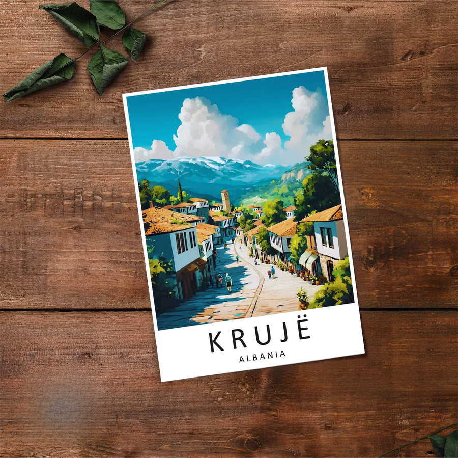 Fine art travel poster showing Krujë Old Bazaar with sunny skies, traditional houses, and historical landmarks displayed across an inviting street view. Choose from flexible display setups including unframed archival paper, wooden frames, or wrapped canvas formats.