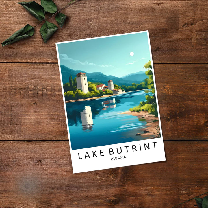 Fine art travel poster showing Lake Butrint with sunny skies, Venetian towers, and relaxed natural scenery across an inviting horizontal view. Choose from flexible display setups including unframed archival paper, wooden frames, or wrapped canvas formats.