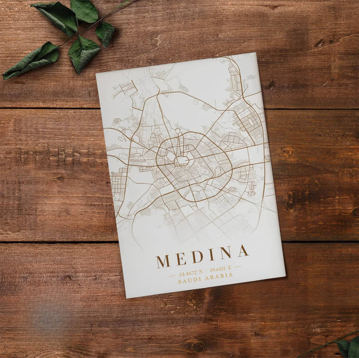 Fine art travel poster of Medina city map with clean title text and subtitle reading SAUDI ARABIA 24.4672 N 39.6111 E. Provided by MapYourDreams, this artwork is available in flexible options including unframed paper, custom wooden frames, and gallery canvas wraps for contemporary setups.