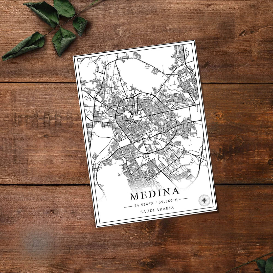 Fine art travel poster of Medina city map with clean title text and subtitle reading SAUDI ARABIA 24.524 N 39.569 E. Provided by MapYourDreams, this artwork is available in flexible options including unframed paper, custom wooden frames, and gallery canvas wraps for contemporary setups.