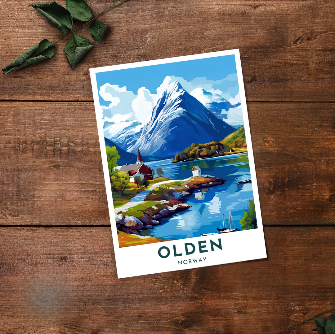 Scandinavian travel print depicting the idyllic waterfront village of Olden in Norway under towering alpine mountain reflections. Created by MapYourDreams, choose from options like unframed paper prints, custom wood framed setups, or gallery wrapped canvas displays.