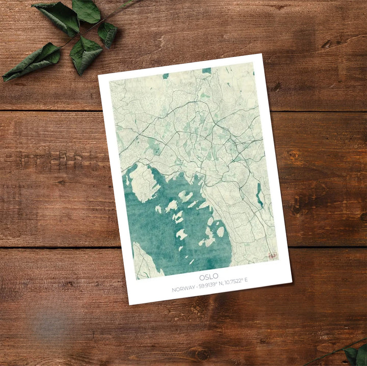 Sophisticated teal city map illustration of Oslo Norway featuring fine vector lines, coastal islands, and clean capital typography. Created by MapYourDreams, choose from options like unframed paper prints, custom wood framed setups, or gallery wrapped canvas displays.