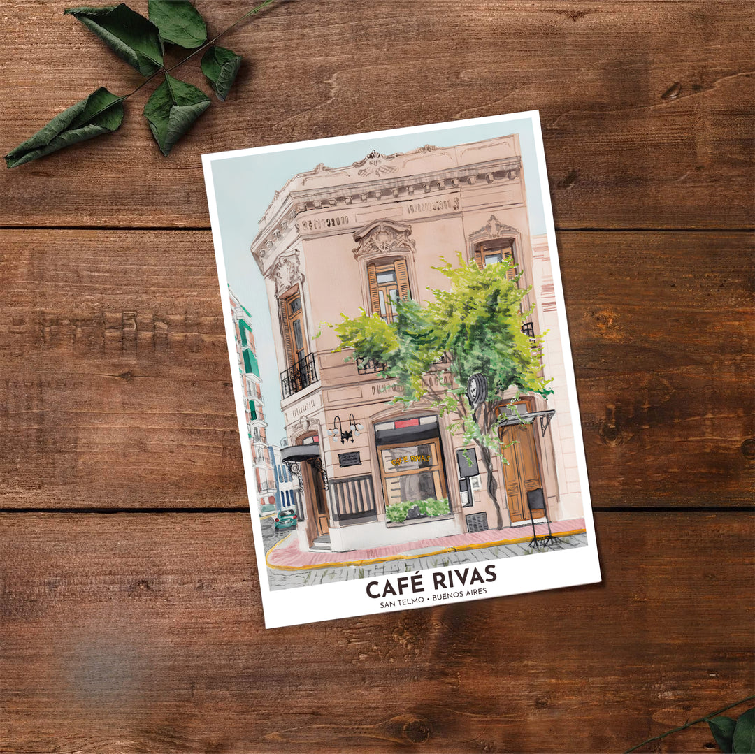 Detailing the lovely Beaux-Arts facade of Café Rivas in San Telmo, this San Telmo Cafe Rivas print serves as elegant travel-inspired decor, thoughtfully produced by MapYourDreams in unframed paper, wooden frame, and canvas display choices.