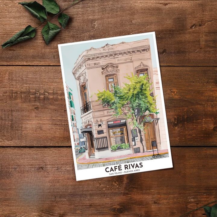 Detailing the lovely Beaux-Arts facade of Café Rivas in San Telmo, this San Telmo Cafe Rivas print serves as elegant travel-inspired decor, thoughtfully produced by MapYourDreams in unframed paper, wooden frame, and canvas display choices.