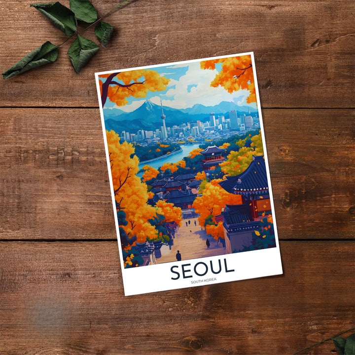 High-contrast vector travel print of Seoul, South Korea, featuring deep indigo tiled roofs, bright marigold ginkgo leaves, a sky-blue river, and distant azure mountain ranges. Offered by MapYourDreams, this artwork is available in flexible options including unframed paper, custom wooden frames, and gallery canvas wraps.